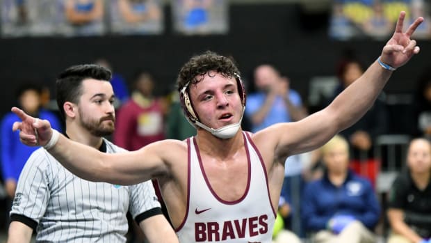 Lake Gibson senior Gianni Maldonado reacts after winning Class 2A 157-pound wrestling state championship on Saturday at Silver Spurs Arena in Kissimmee. It was the second straight state title of his career. 